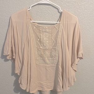 This is a blush colored top, great for going out!